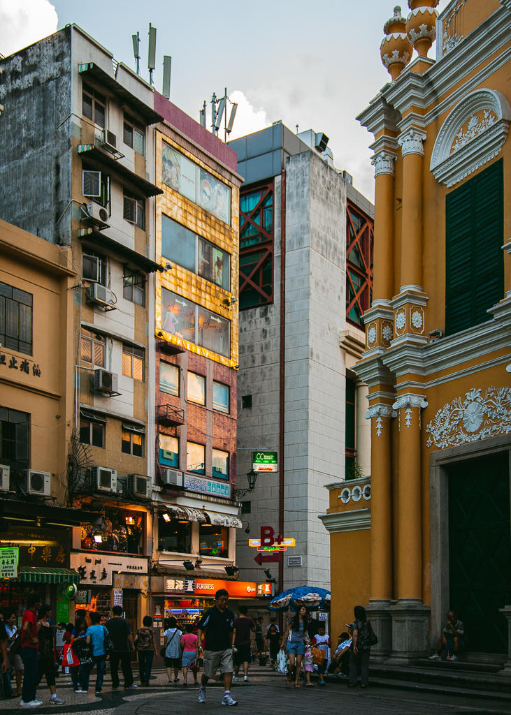 St. Dominic's Church and its adjacent street lined with residential and commercial buildings.